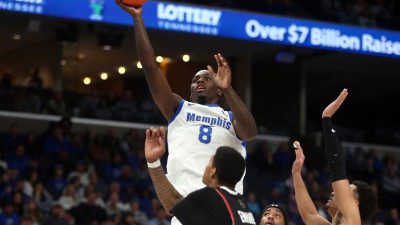 Dec 30, 2023; Memphis, Tennessee, USA; Memphis Tigers forward David Jones (8) shoots during the first half against the Austin Peay Governors at FedExForum. Mandatory Credit: Petre Thomas-USA TODAY Sports