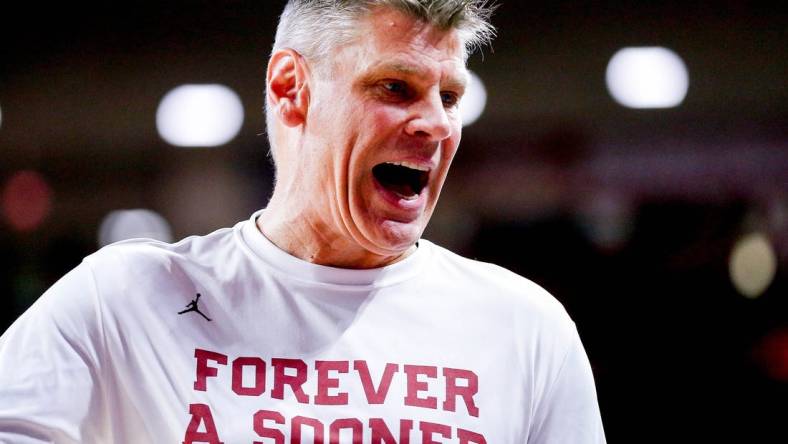 Oklahoma head coach Porter Moser yells to the bench in the first half during an NCAA game between the Oklahoma Sooners and the Central Arknasaw Bears at the Lloyd Noble Center in Norman, Okla., on Thursday, Dec. 28, 2023.