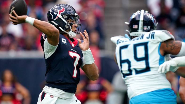 Houston Texans quarterback C.J. Stroud (7) throws the ball against the Tennessee Titans during the second quarter at NRG Stadium in Houston, Texas., Sunday, Dec. 31, 2023.