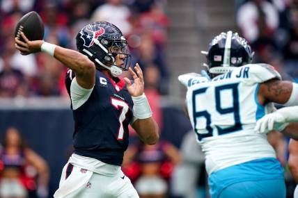 Houston Texans quarterback C.J. Stroud (7) throws the ball against the Tennessee Titans during the second quarter at NRG Stadium in Houston, Texas., Sunday, Dec. 31, 2023.