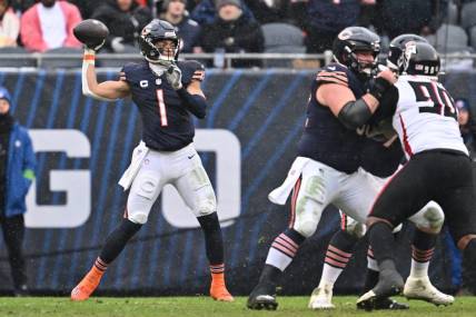 Dec 31, 2023; Chicago, Illinois, USA;  Chicago Bears quarterback Justin Fields (1) passes in the first half against the Atlanta Falcons at Soldier Field. Mandatory Credit: Jamie Sabau-USA TODAY Sports