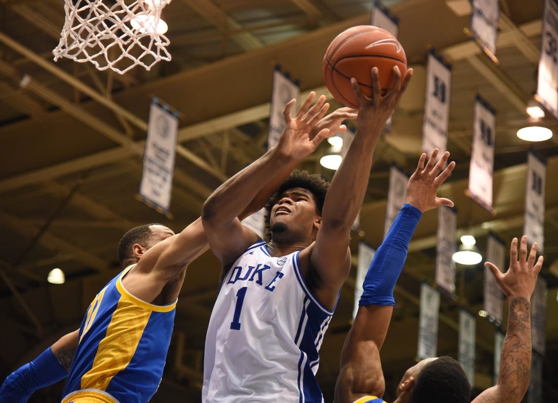 Jan 28, 2020; Durham, North Carolina, USA; Duke Blue Devils center Vernon Carey Jr. (1) shoots over Pitt Panthers forward Terrell Brown (21) during the second half at Cameron Indoor Stadium. Mandatory Credit: Rob Kinnan-USA TODAY Sports