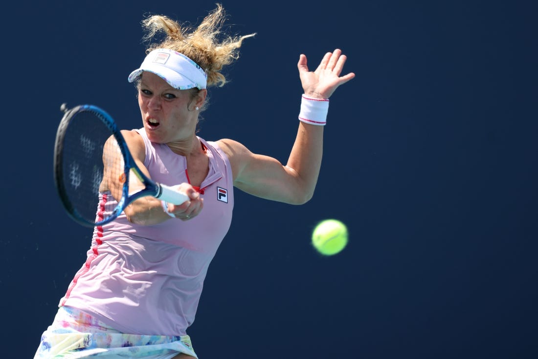 Mar 23, 2021; Miami, Florida, USA; Laura Siegemund of Germany hits a forehand against Christina McHale of the United States (not pictured) in the first round of the Miami Open at Hard Rock Stadium. Mandatory Credit: Geoff Burke-USA TODAY Sports