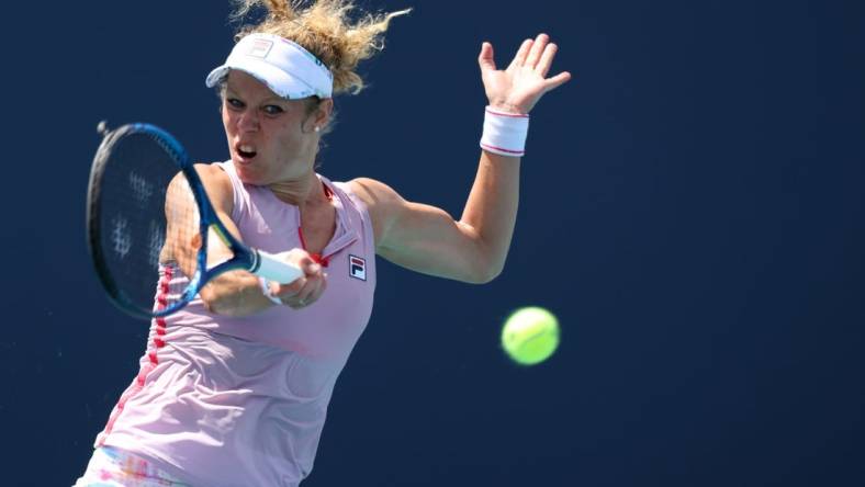 Mar 23, 2021; Miami, Florida, USA; Laura Siegemund of Germany hits a forehand against Christina McHale of the United States (not pictured) in the first round of the Miami Open at Hard Rock Stadium. Mandatory Credit: Geoff Burke-USA TODAY Sports