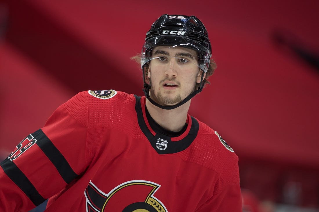 Mar 25, 2021; Ottawa, Ontario, CAN; Ottawa Senators left wing Alex Formenton (59) skates during warmup prior to game against the Toronto Maple Leafs at the Canadian Tire Centre. Mandatory Credit: Marc DesRosiers-USA TODAY Sports