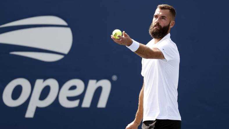 Aug 30, 2021; Flushing, NY, USA; Benoit Paire (FRA) serves to Dusan Lajovic (SRB) in a first round match on day one of the 2021 U.S. Open tennis tournament at USTA Billie King National Tennis Center. Mandatory Credit: Jerry Lai-USA TODAY Sports