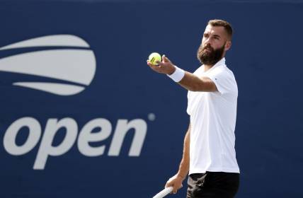 Aug 30, 2021; Flushing, NY, USA; Benoit Paire (FRA) serves to Dusan Lajovic (SRB) in a first round match on day one of the 2021 U.S. Open tennis tournament at USTA Billie King National Tennis Center. Mandatory Credit: Jerry Lai-USA TODAY Sports
