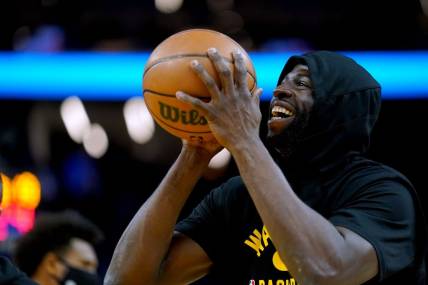 Nov 24, 2021; San Francisco, California, USA; Golden State Warriors forward Draymond Green (23) smiles during warmups before the start of the game against the Philadelphia 76ers at the Chase Center. Mandatory Credit: Cary Edmondson-USA TODAY Sports