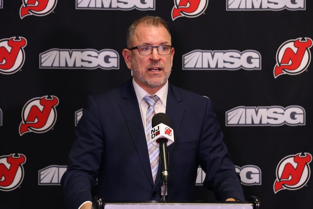 Nov 30, 2021; Newark, New Jersey, USA; New Jersey Devils executive vice president/general managerTom Fitzgerald, addresses the media about the contract extension of New Jersey Devils center Jack Hughes (86) before the start of the game against the San Jose Sharks at Prudential Center. Mandatory Credit: Tom Horak-USA TODAY Sports