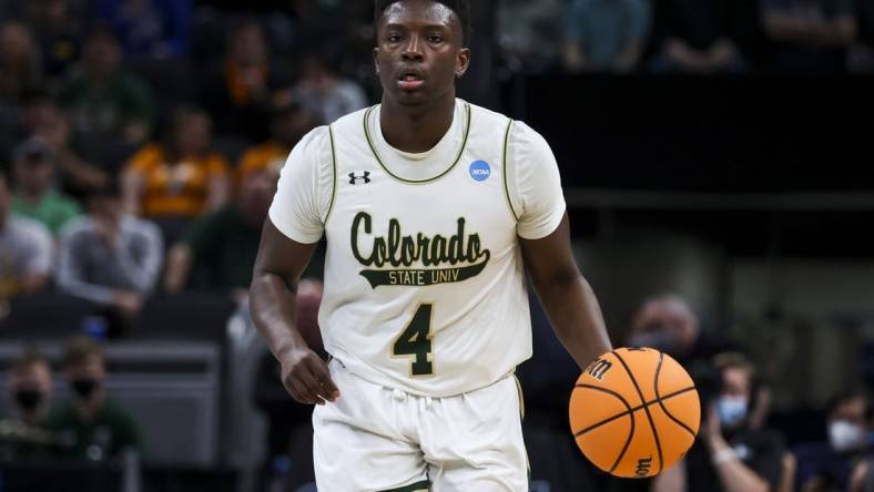 Mar 17, 2022; Indianapolis, IN, USA; Colorado State Rams guard Isaiah Stevens (4) controls the ball against the Michigan Wolverines in the first half during the first round of the 2022 NCAA Tournament at Gainbridge Fieldhouse. Mandatory Credit: Trevor Ruszkowski-USA TODAY Sports