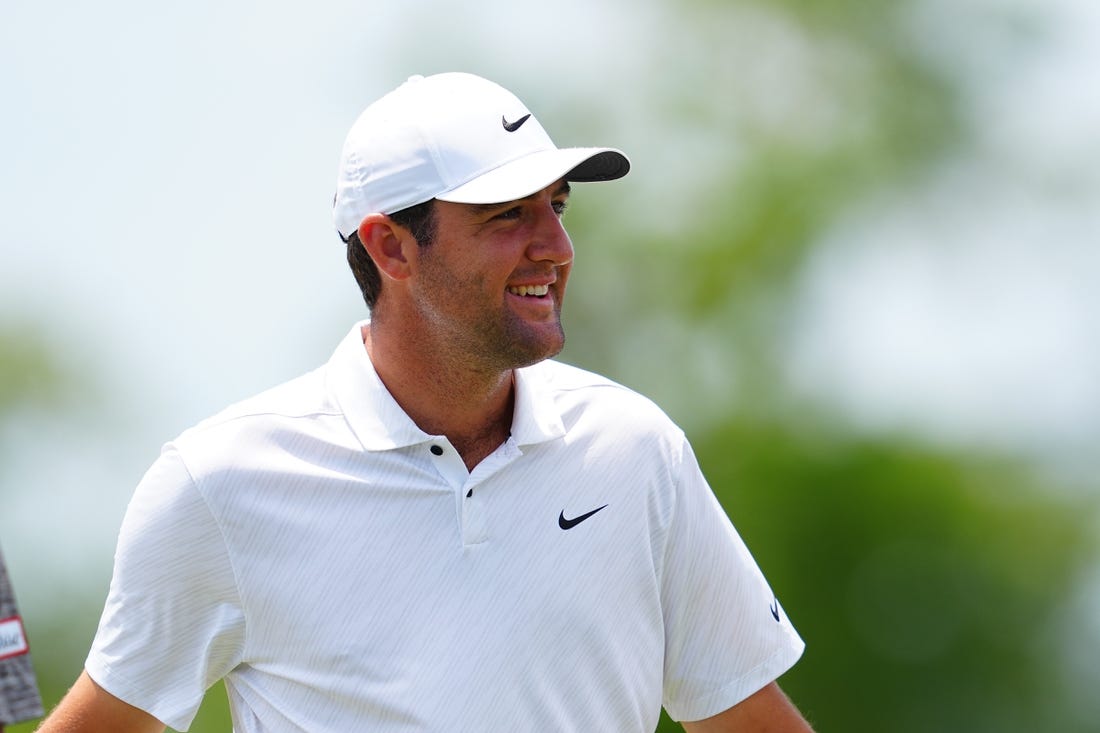 Apr 22, 2022; Avondale, Louisiana, USA; Scottie Scheffler smiles on the ninth hole green during the second round of the Zurich Classic of New Orleans golf tournament. Mandatory Credit: Andrew Wevers-USA TODAY Sports