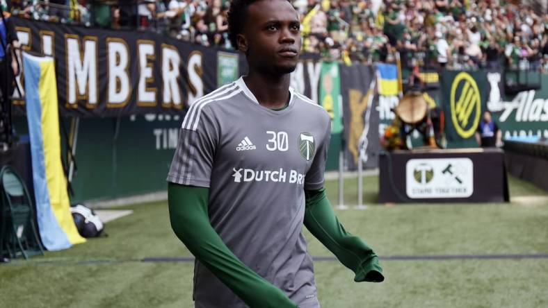 May 22, 2022; Portland, Oregon, USA; Portland Timbers midfielder Santiago Moreno (30) walks on to the field for warm ups before the match against the Philadelphia Union at Providence Park. Mandatory Credit: Soobum Im-USA TODAY Sports