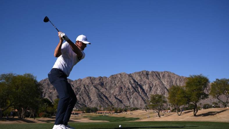 Jan 21, 2023; La Quinta, California, USA; Scottie Scheffler plays his shot from the third tee during the third round of The American Express golf tournament at Pete Dye Stadium Course. Mandatory Credit: Orlando Ramirez-USA TODAY Sports