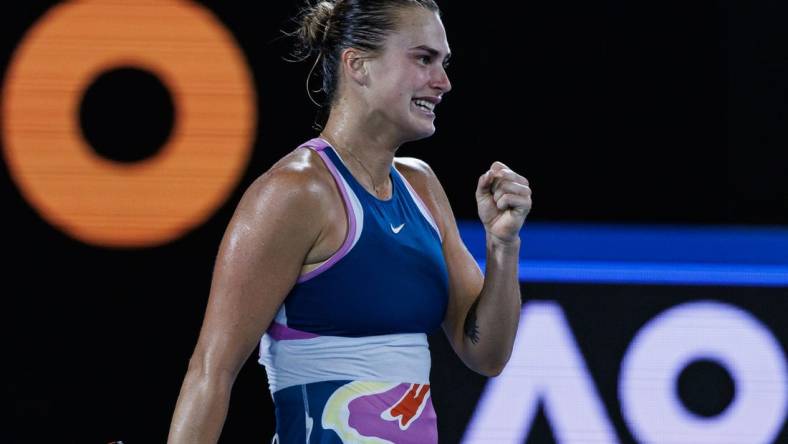 Jan 28, 2023; Melbourne, Victoria, Australia; Aryna Sabalenka of Belarus celebrates after her victory over Elena Ribakina of Kazakhstan in the women   s singles final on day thirteen of the 2023 Australian Open tennis tournament at Melbourne Park. Mandatory Credit: Mike Frey-USA TODAY Sports