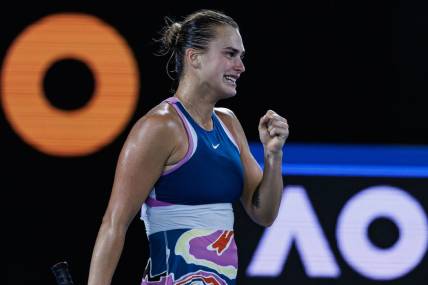 Jan 28, 2023; Melbourne, Victoria, Australia; Aryna Sabalenka of Belarus celebrates after her victory over Elena Ribakina of Kazakhstan in the women   s singles final on day thirteen of the 2023 Australian Open tennis tournament at Melbourne Park. Mandatory Credit: Mike Frey-USA TODAY Sports