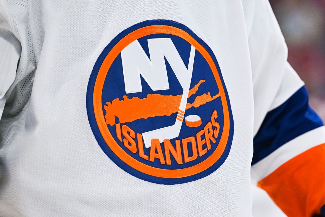 Feb 11, 2023; Montreal, Quebec, CAN; View of a New York Islanders logo on a jersey worn by a member of the team against the Montreal Canadiens during the second period at Bell Centre. Mandatory Credit: David Kirouac-USA TODAY Sports