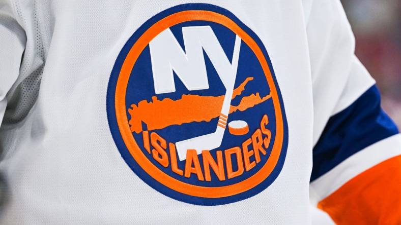 Feb 11, 2023; Montreal, Quebec, CAN; View of a New York Islanders logo on a jersey worn by a member of the team against the Montreal Canadiens during the second period at Bell Centre. Mandatory Credit: David Kirouac-USA TODAY Sports