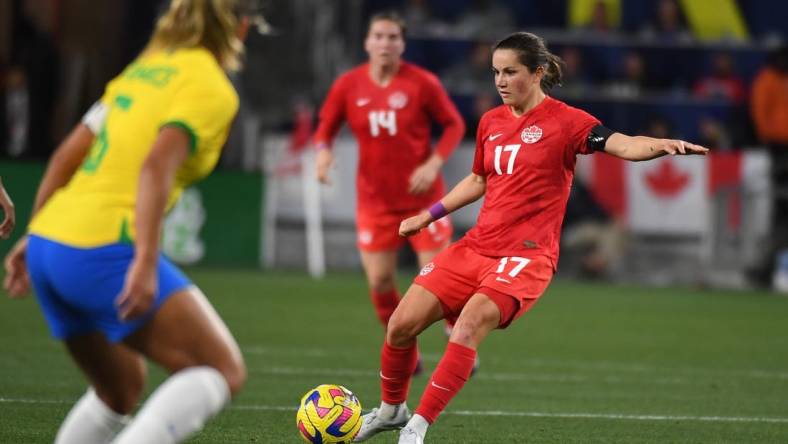 Feb 19, 2023; Nashville, Tennessee, USA; Canada midfielder Jessie Fleming (17) passes the ball during the first half against Brazil at Geodis Park. Mandatory Credit: Christopher Hanewinckel-USA TODAY Sports