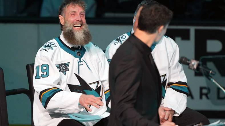 Feb 25, 2023; San Jose, California, USA; San Jose Sharks former player Joe Thornton laughs during the Patrick Marleau jersey retirement ceremony before the game against the Chicago Blackhawks at SAP Center at San Jose. Mandatory Credit: Darren Yamashita-USA TODAY Sports