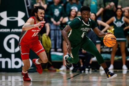 Mar 3, 2023; Fort Collins, Colorado, USA; Colorado State Rams guard Isaiah Stevens (4) dribbles the ball up court against New Mexico Lobos guard Jaelen House (10) in the second half at Moby Arena. Mandatory Credit: Isaiah J. Downing-USA TODAY Sports