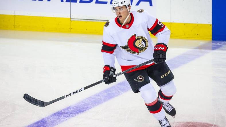 Mar 12, 2023; Calgary, Alberta, CAN; Ottawa Senators center Shane Pinto (57) skates during the warmup period against the Calgary Flames at Scotiabank Saddledome. Mandatory Credit: Sergei Belski-USA TODAY Sports