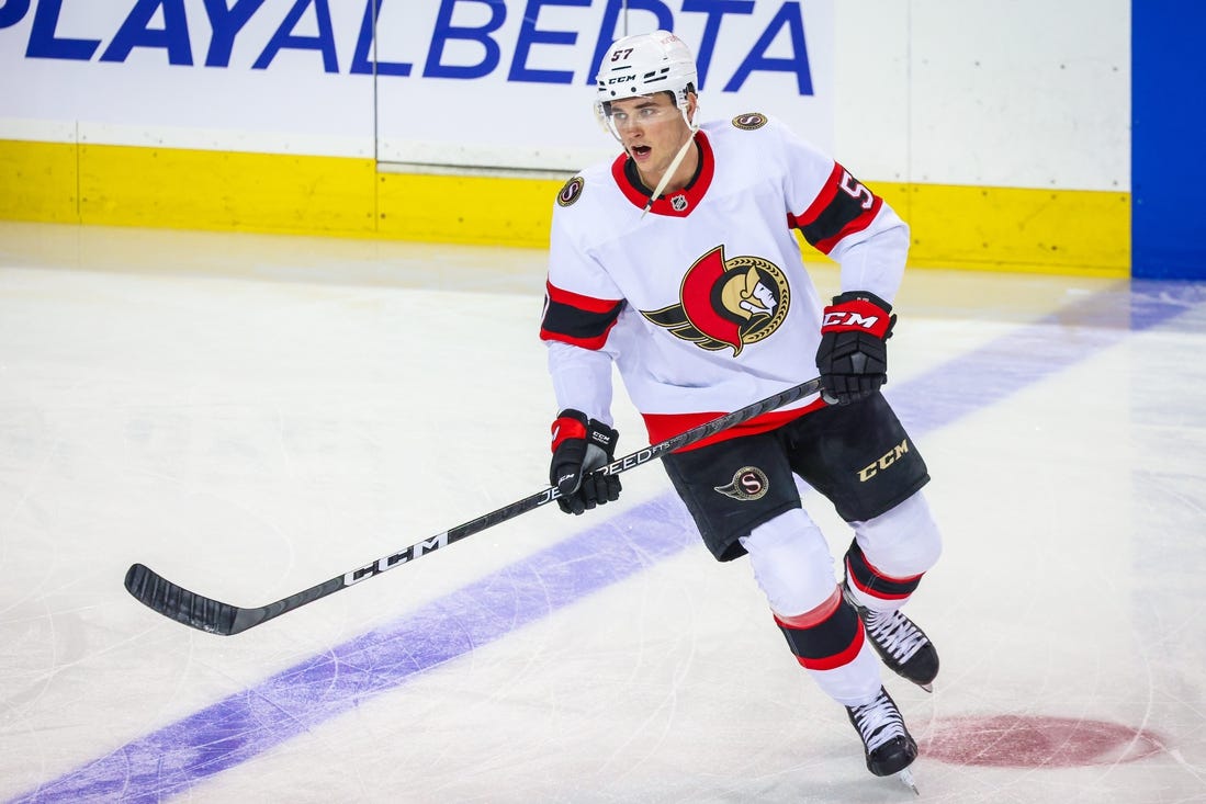 Mar 12, 2023; Calgary, Alberta, CAN; Ottawa Senators center Shane Pinto (57) skates during the warmup period against the Calgary Flames at Scotiabank Saddledome. Mandatory Credit: Sergei Belski-USA TODAY Sports