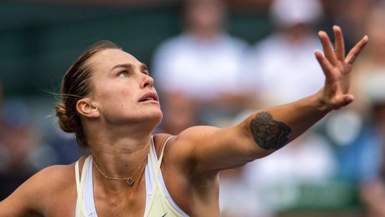 Aryna Sabalenka of Belarus focuses on the ball before taking a swing at Elena Rybakina of Kazakhstan during the women's singles final of the BNP Paribas Open at the Indian Wells Tennis Garden in Indian Wells, Calif., Sunday, March 19, 2023.