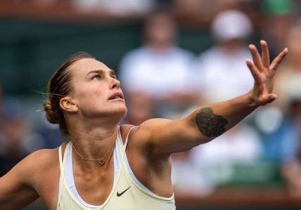 Aryna Sabalenka of Belarus focuses on the ball before taking a swing at Elena Rybakina of Kazakhstan during the women's singles final of the BNP Paribas Open at the Indian Wells Tennis Garden in Indian Wells, Calif., Sunday, March 19, 2023.