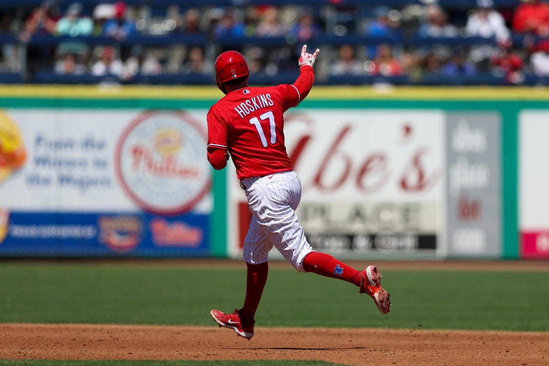 Mar 20, 2023; Clearwater, Florida, USA;  Philadelphia Phillies first baseman Rhys Hoskins (17) rounds the bases after hitting a two-run home run against the Baltimore Orioles in the second inning during spring training at BayCare Ballpark. Mandatory Credit: Nathan Ray Seebeck-USA TODAY Sports