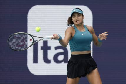 Mar 22, 2023; Miami, Florida, US; Emma Raducanu (GBR) hits a forehand against Bianca Andreescu (CAN) (not pictured) on day three of the Miami Open at Hard Rock Stadium. Mandatory Credit: Geoff Burke-USA TODAY Sports