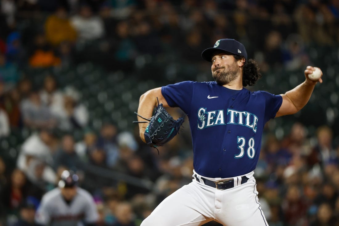 Mar 31, 2023; Seattle, Washington, USA; Seattle Mariners starting pitcher Robbie Ray (38) throws against the Cleveland Guardians during the first inningat T-Mobile Park. Mandatory Credit: Joe Nicholson-USA TODAY Sports