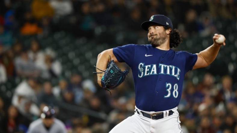 Mar 31, 2023; Seattle, Washington, USA; Seattle Mariners starting pitcher Robbie Ray (38) throws against the Cleveland Guardians during the first inningat T-Mobile Park. Mandatory Credit: Joe Nicholson-USA TODAY Sports