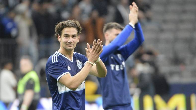 Apr 1, 2023; Vancouver, British Columbia, CAN;  Vancouver Whitecaps FC forward Simon Becher (29) celebrates the win over the CF Montreal after the second half at BC Place. Mandatory Credit: Anne-Marie Sorvin-USA TODAY Sports