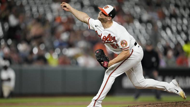 May 10, 2023; Baltimore, Maryland, USA; Baltimore Orioles relief pitcher Austin Voth (51) pitches against the Tampa Bay Rays during the eighth inning at Oriole Park at Camden Yards. Mandatory Credit: Brent Skeen-USA TODAY Sports