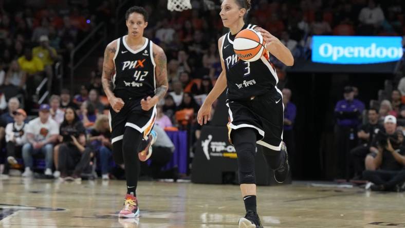 May 21, 2023; Phoenix, Arizona, USA; Phoenix Mercury guard Diana Taurasi (3) and center Brittney Griner (42) run up court against the Chicago Sky in the first half at Footprint Center. Mandatory Credit: Rick Scuteri-USA TODAY Sports