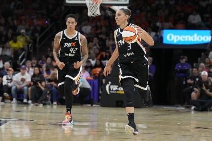 May 21, 2023; Phoenix, Arizona, USA; Phoenix Mercury guard Diana Taurasi (3) and center Brittney Griner (42) run up court against the Chicago Sky in the first half at Footprint Center. Mandatory Credit: Rick Scuteri-USA TODAY Sports