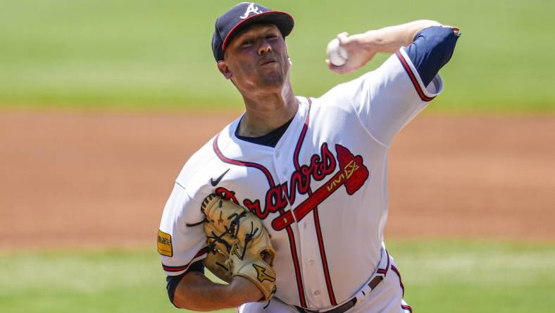 Jun 28, 2023; Cumberland, Georgia, USA; Atlanta Braves starting pitcher Kolby Allard (49) pitches against the Minnesota Twins during the first inning at Truist Park. Mandatory Credit: Dale Zanine-USA TODAY Sports