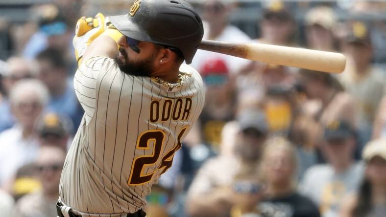 Jun 29, 2023; Pittsburgh, Pennsylvania, USA; San Diego Padres right fielder Rougned Odor (24) hits a single against the Pittsburgh Pirates during the second inning at PNC Park. Mandatory Credit: Charles LeClaire-USA TODAY Sports