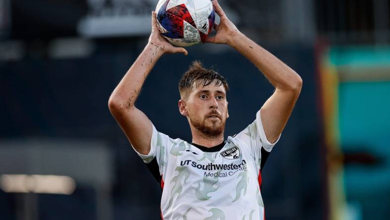 Jul 8, 2023; Commerce City, Colorado, USA; FC Dallas defender Amet Korca (24) throws in the ball in the first half against the Colorado Rapids at Dick's Sporting Goods Park. Mandatory Credit: Isaiah J. Downing-USA TODAY Sports