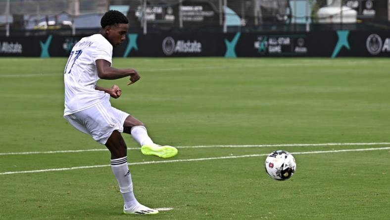 Jul 19, 2023; Annapolis, MD, USA; MLS NEXT East player Tahir Reid-Brown (17) of Orlando City SC scores on a penalty kick during a shootout in the 2023 MLS NEXT All Star Game at Glenn Warner Soccer Facility at the Naval Academy. Mandatory Credit: Reggie Hildred-USA TODAY Sports