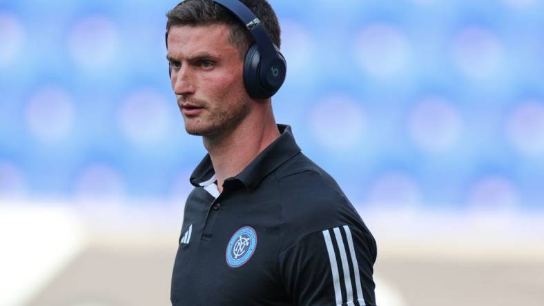 Jul 26, 2023; Harrison, NJ, USA; New York City FC goalkeeper Cody Mizell (25) with beats wireless headphones on the pitch before the match against Toronto FC at Red Bull Arena. Mandatory Credit: Vincent Carchietta-USA TODAY Sports