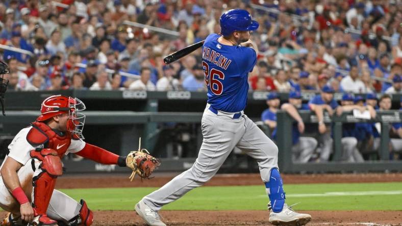 Jul 28, 2023; St. Louis, Missouri, USA;  Chicago Cubs first baseman Trey Mancini (36) hits a one run single against the St. Louis Cardinals during the sixth inning at Busch Stadium. Mandatory Credit: Jeff Curry-USA TODAY Sports