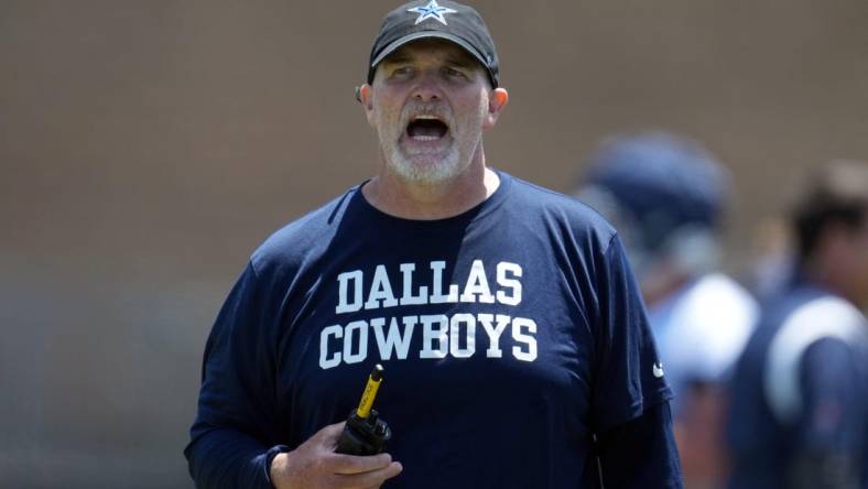 Jul 29, 2023; Oxnard, CA, USA; Dallas Cowboys defensive coordinator Dan Quinn reacts during training camp at the River Ridge Fields. Mandatory Credit: Kirby Lee-USA TODAY Sports