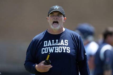 Jul 29, 2023; Oxnard, CA, USA; Dallas Cowboys defensive coordinator Dan Quinn reacts during training camp at the River Ridge Fields. Mandatory Credit: Kirby Lee-USA TODAY Sports