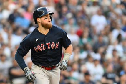 Aug 1, 2023; Seattle, Washington, USA; Boston Red Sox second baseman Christian Arroyo (39) runs toward first base after hitting a two run RBI double against the Seattle Mariners during the fourth inning at T-Mobile Park. Mandatory Credit: Steven Bisig-USA TODAY Sports