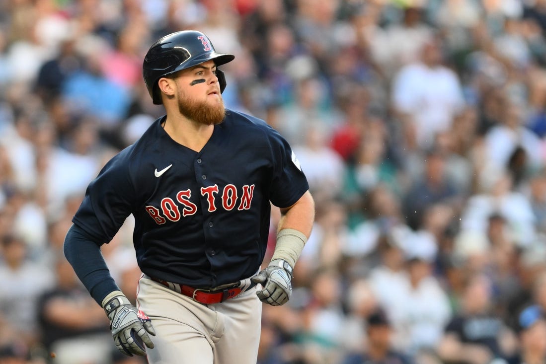 Aug 1, 2023; Seattle, Washington, USA; Boston Red Sox second baseman Christian Arroyo (39) runs toward first base after hitting a two run RBI double against the Seattle Mariners during the fourth inning at T-Mobile Park. Mandatory Credit: Steven Bisig-USA TODAY Sports