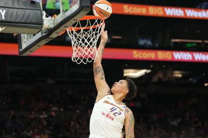 Aug 5, 2023; Phoenix, Arizona, USA; Phoenix Mercury center Brittney Griner (42) puts up a layup against the Seattle Storm during the first half at Footprint Center. Mandatory Credit: Joe Camporeale-USA TODAY Sports