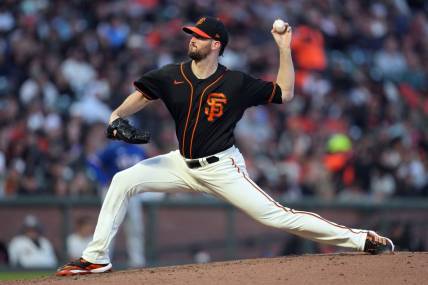 Aug 12, 2023; San Francisco, California, USA; San Francisco Giants starting pitcher Alex Wood (57) throws a pitch against the Texas Rangers during the sixth inning at Oracle Park. Mandatory Credit: Darren Yamashita-USA TODAY Sports