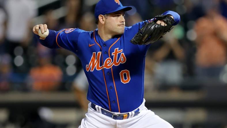 Aug 14, 2023; New York City, New York, USA; New York Mets relief pitcher Adam Ottavino (0) pitches against the Pittsburgh Pirates during the ninth inning at Citi Field. Mandatory Credit: Brad Penner-USA TODAY Sports