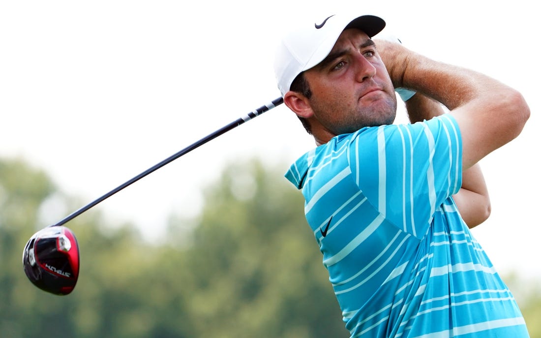 Aug 26, 2023; Atlanta, Georgia, USA; Scottie Scheffler plays his shot from the fourth tee during the third round of the TOUR Championship golf tournament at East Lake Golf Club. Mandatory Credit: John David Mercer-USA TODAY Sports